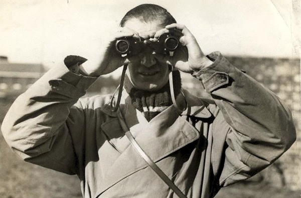 man-with-vintage-binoculars
