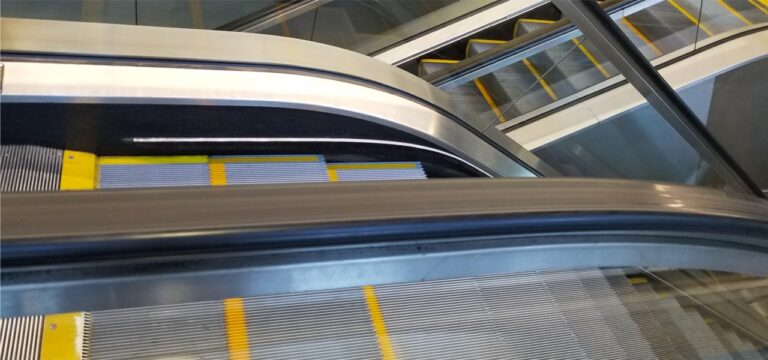 A maze of escalators intertwined left to right