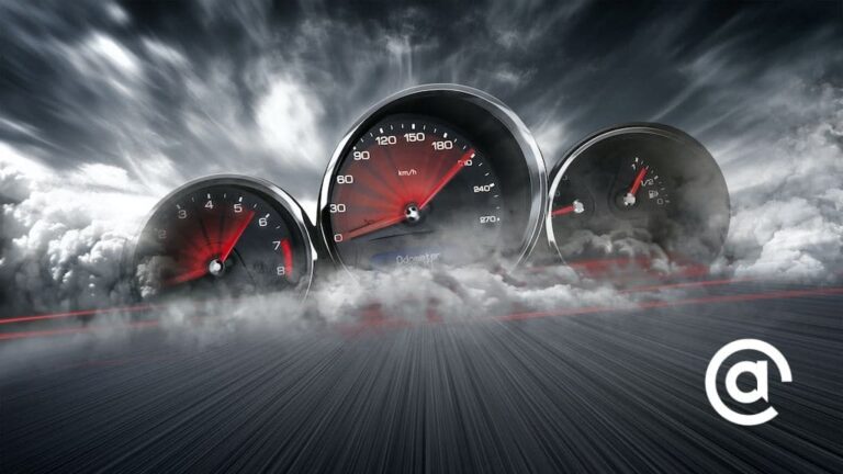 Image of sports car speedometers on crashing waves