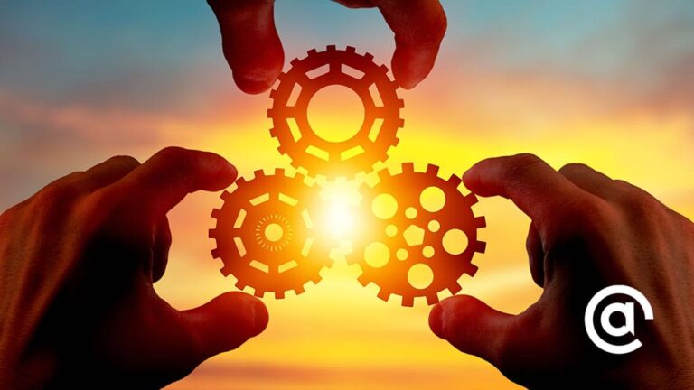 Three gears with the sun in the background to demonstrate connectedness.