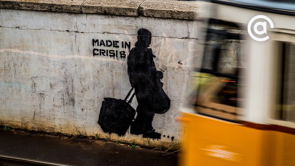 Graffiti that says "Made in Crisis"