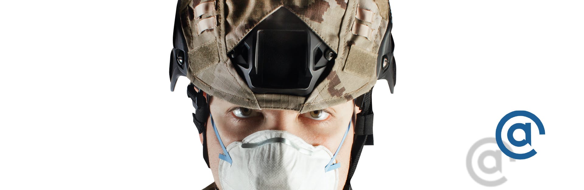 Soldier with helmet, also wearing a medical mask