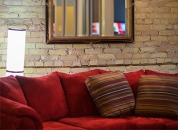 red couch in the Duluth office
